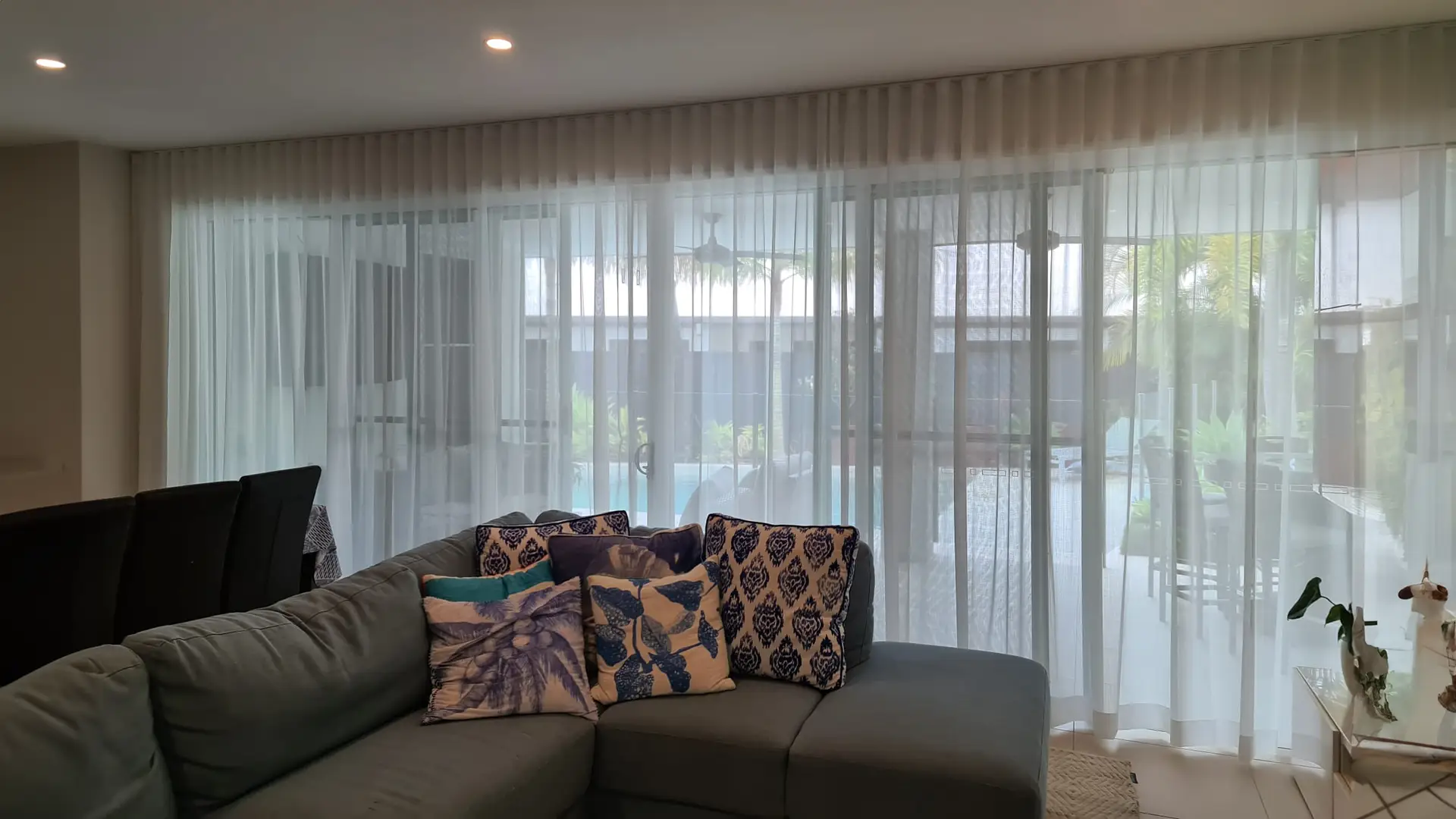 Sheer curtains installed across a Gold Coast living room