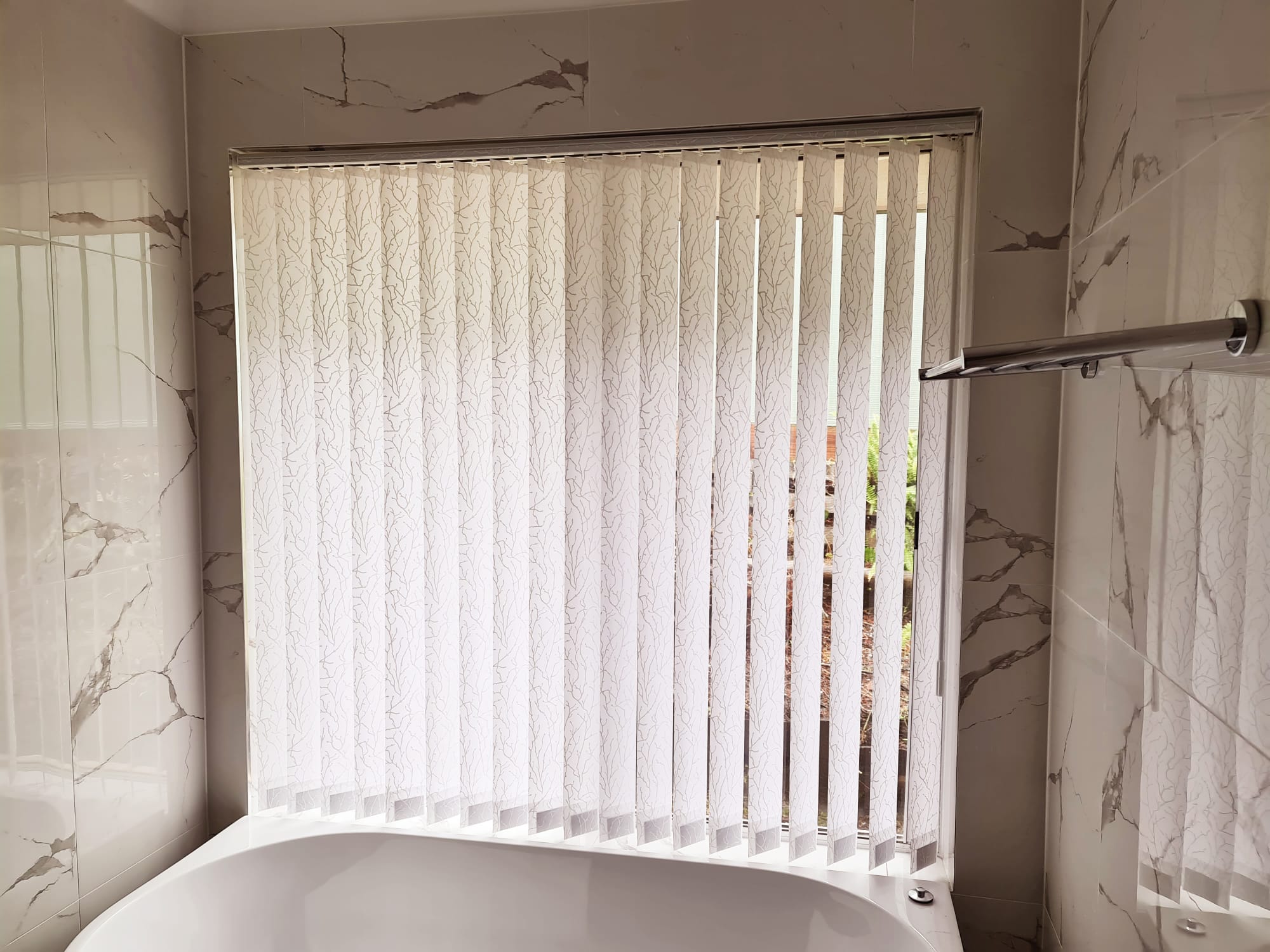 Vertical blinds in a bathroom