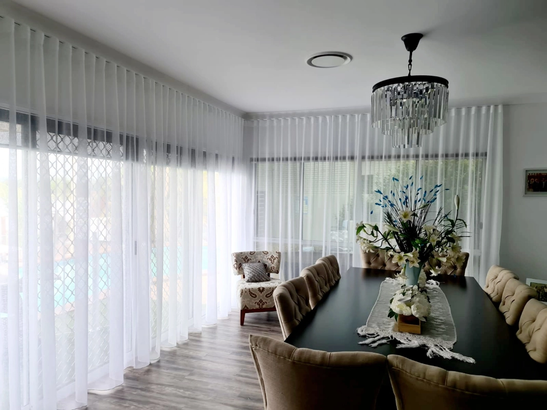Sheer curtains in a dining room