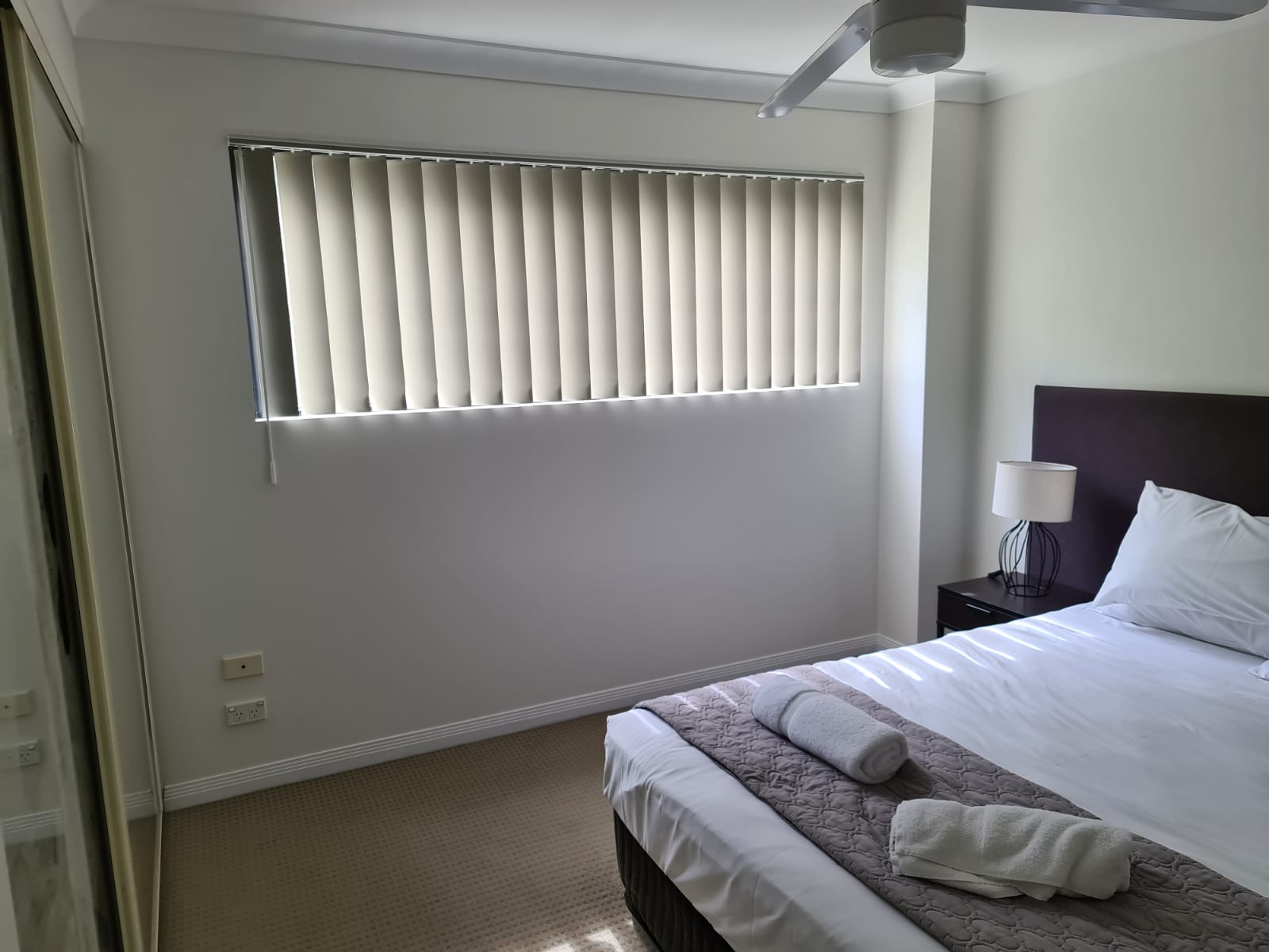 Vertical blinds in a bedroom