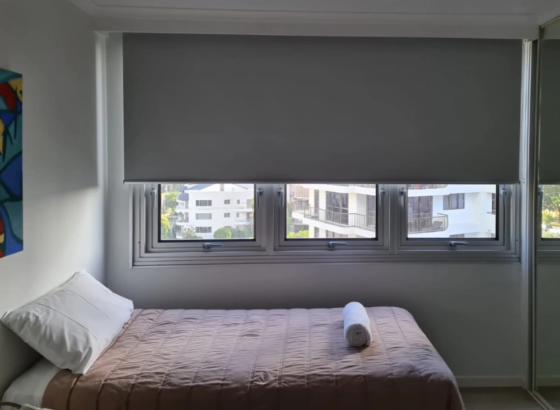 Blockout roller blinds in a Gold Coast bedroom