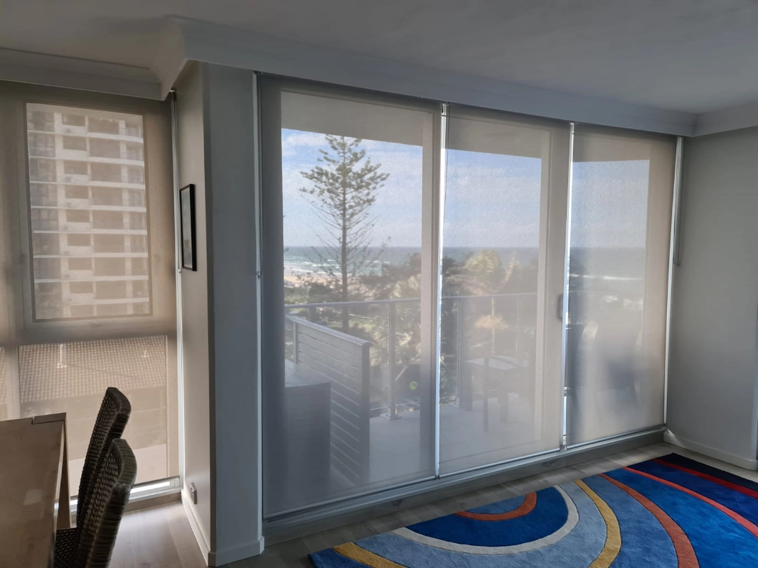 Light filtering roller blinds in a Gold Coast apartment with ocean views