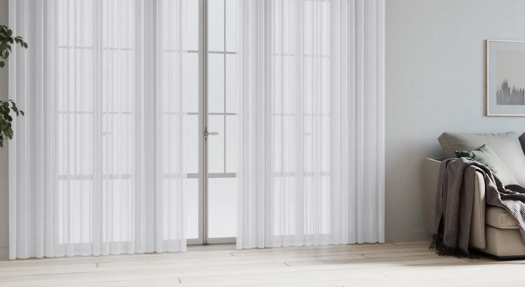 Sheer curtains and a sofa in a Carrara inspired living room