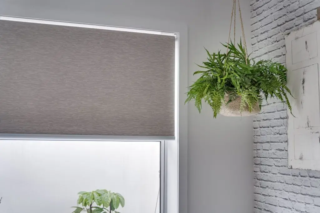 Custom blinds in a Carrara bedroom