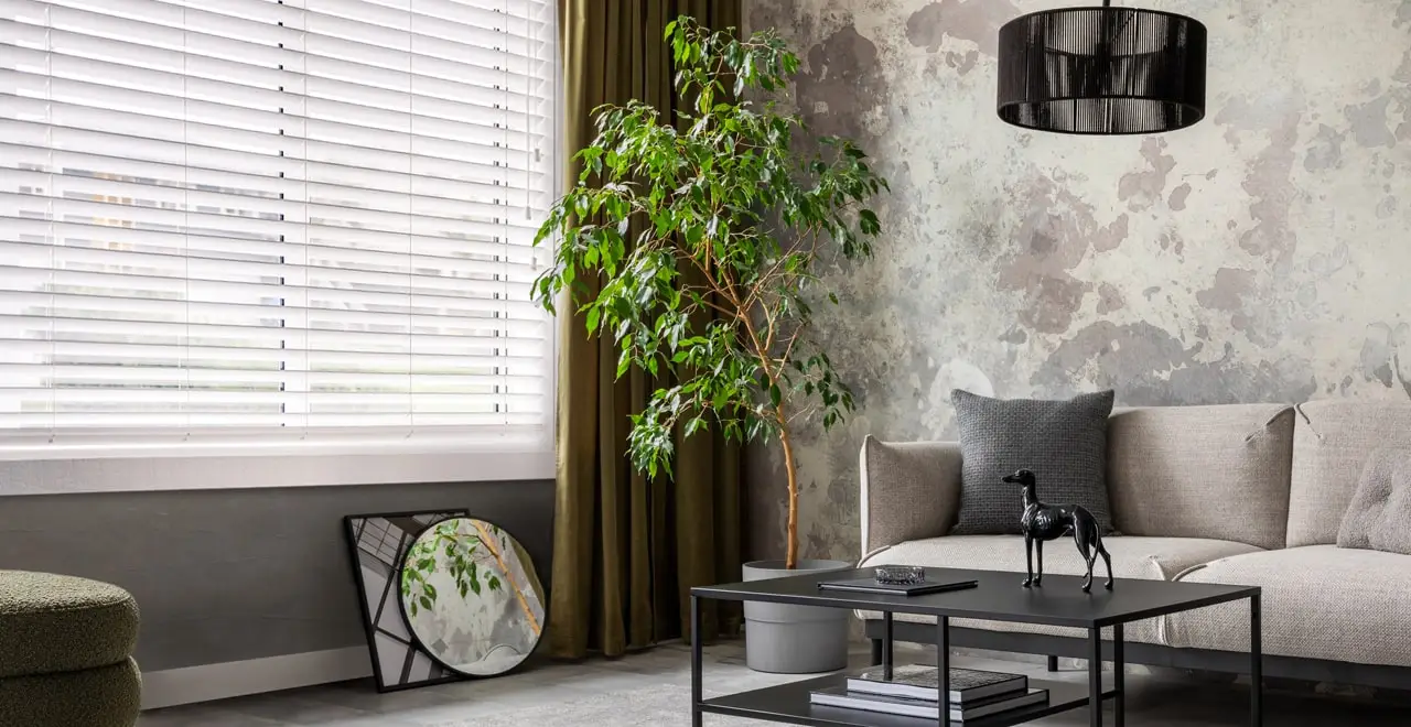 Venetian blinds and curtains in a styled Carrara living room