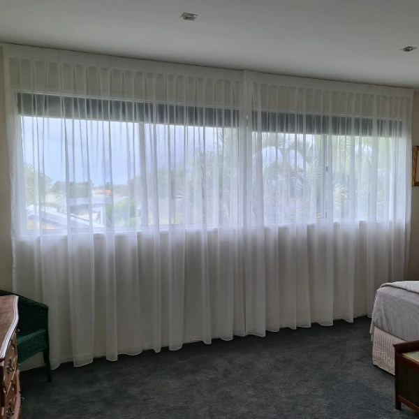 Sheer curtains in a Mermaid Waters bedroom