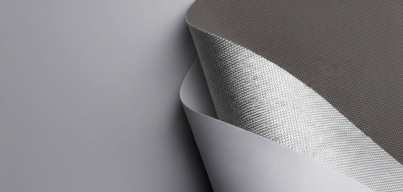 Close up of layered window furnishing fabric swatches