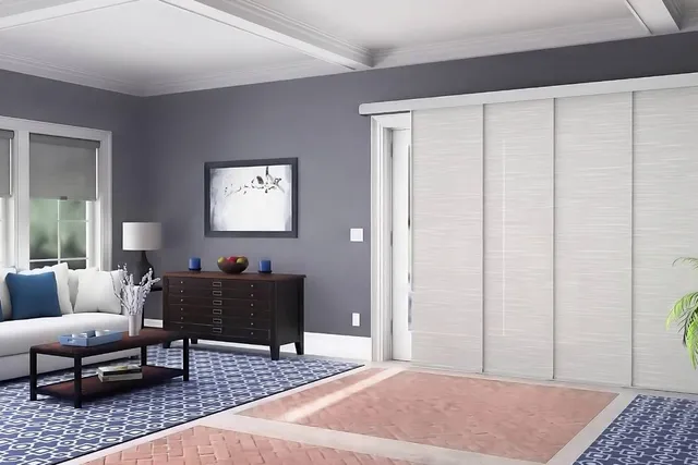 Light panel blinds fitted across a wide sliding glass door