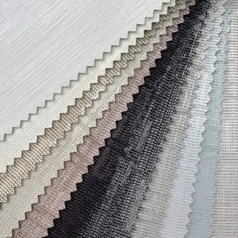 Neutral blockout roller blind fabric samples in a range of textures and colours