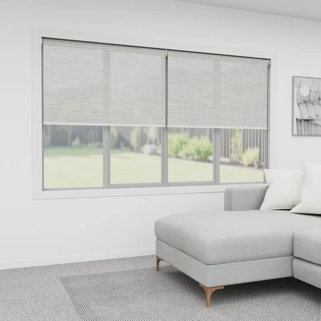 Light filtering roller blinds installed in a bright Gold Coast living room