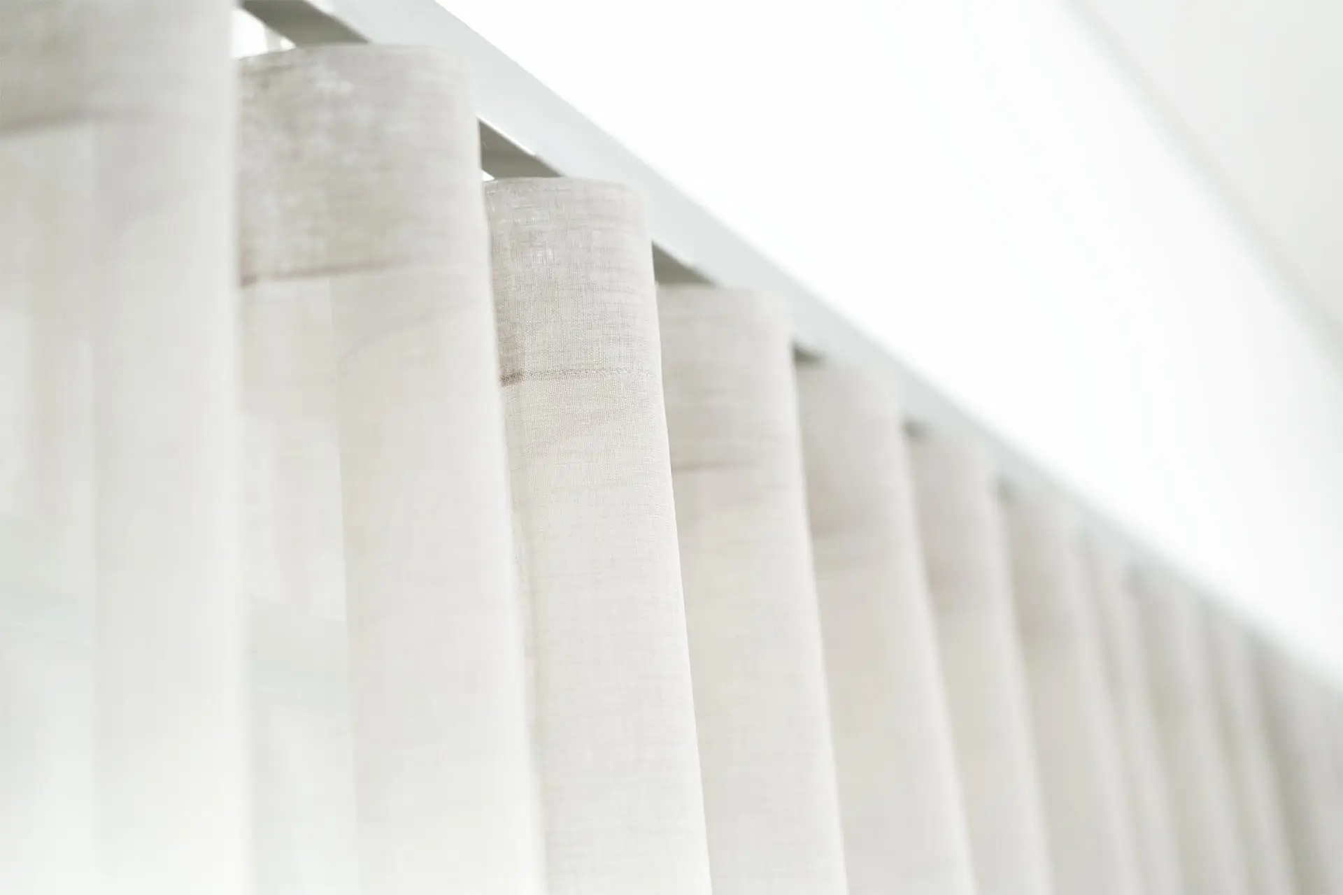 Close detail of wave fold sheer curtain fabric