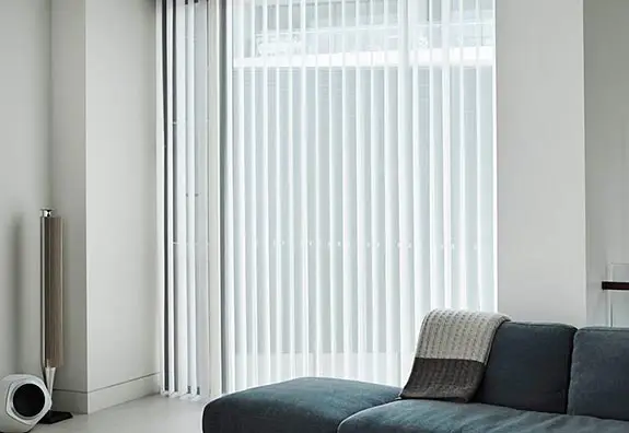 Veri Shades drawn across a bright window opening